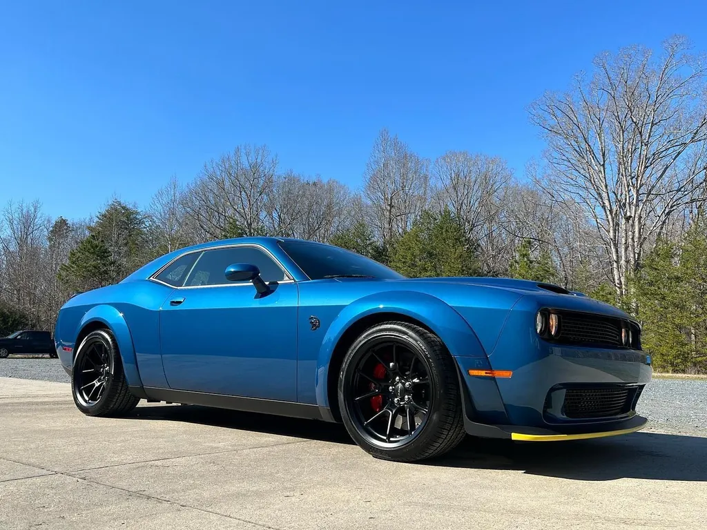 Blue Dodge Challenger SRT Widebody outside the Petty Shine shop after a full detail