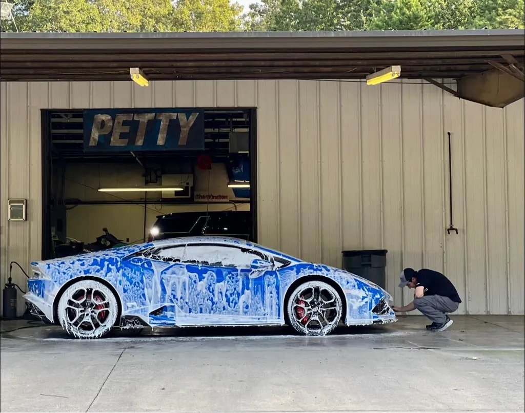 Lamborghini Huracan covered in foam during a decontamination wash at Petty Shine